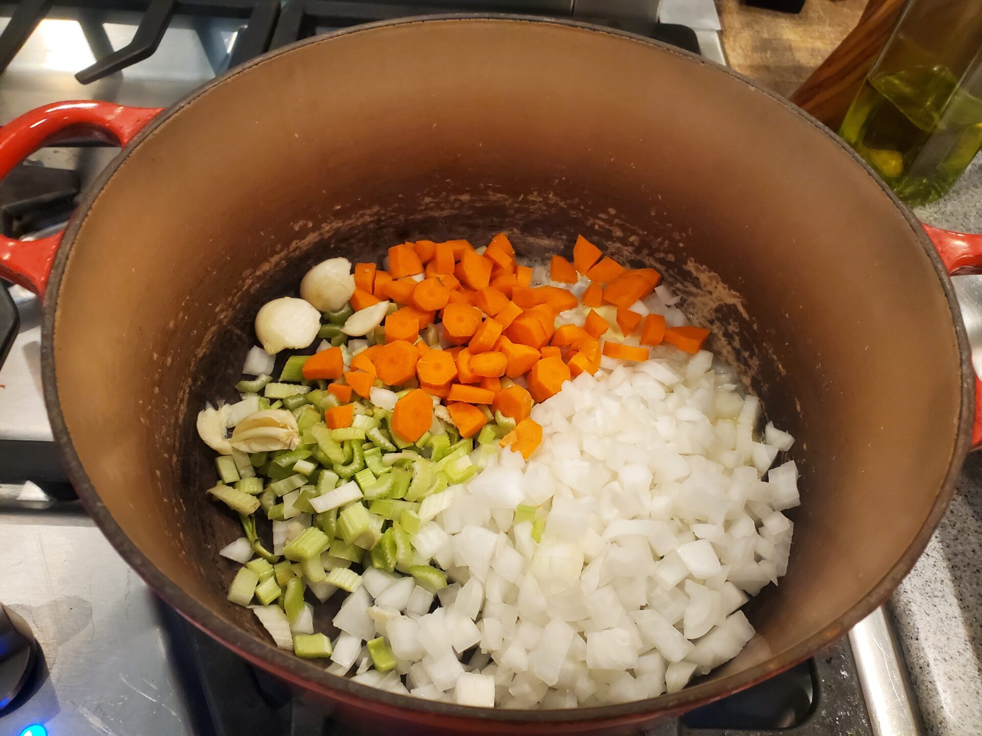 Melt butter then add carrots, celery, garlic and onions.