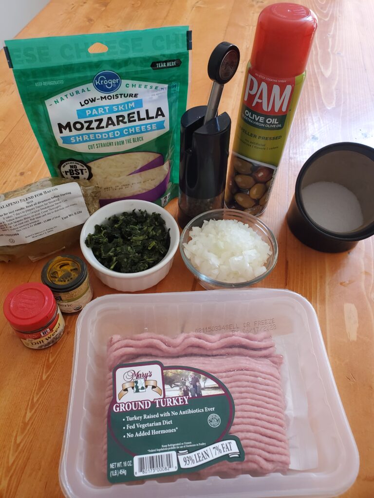 Ingredients needed for this recipe.  Ground turkey, chopped spinach, onion, mozzarella, salt, pepper and spices
